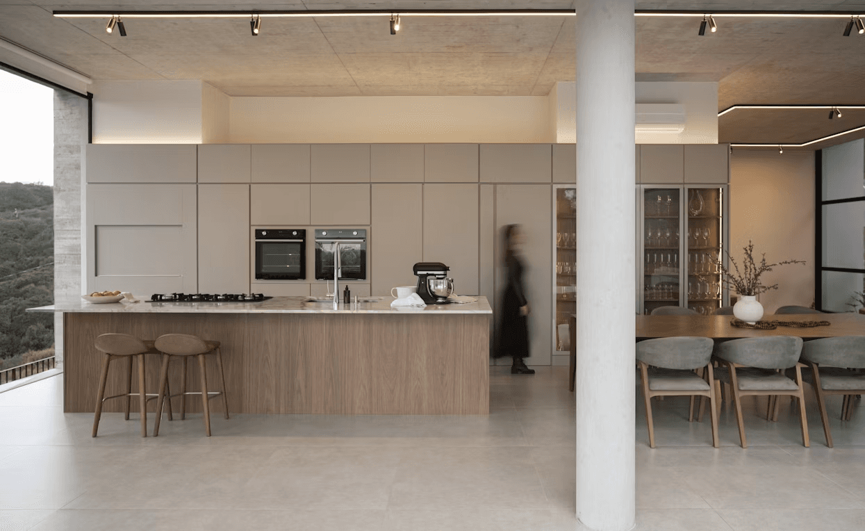 Renovated kitchen with warm wood cabinetry and natural light